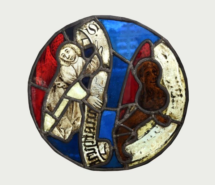 St Marc représenté en lion et St Matthieu tenant une banderole à son nom
